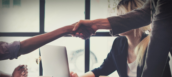 Customer and accountant shaking hands to agree accounting services and support